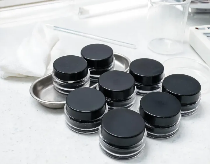 Gel Eyeliner Sourcing on a cosmetics bench, illustration only